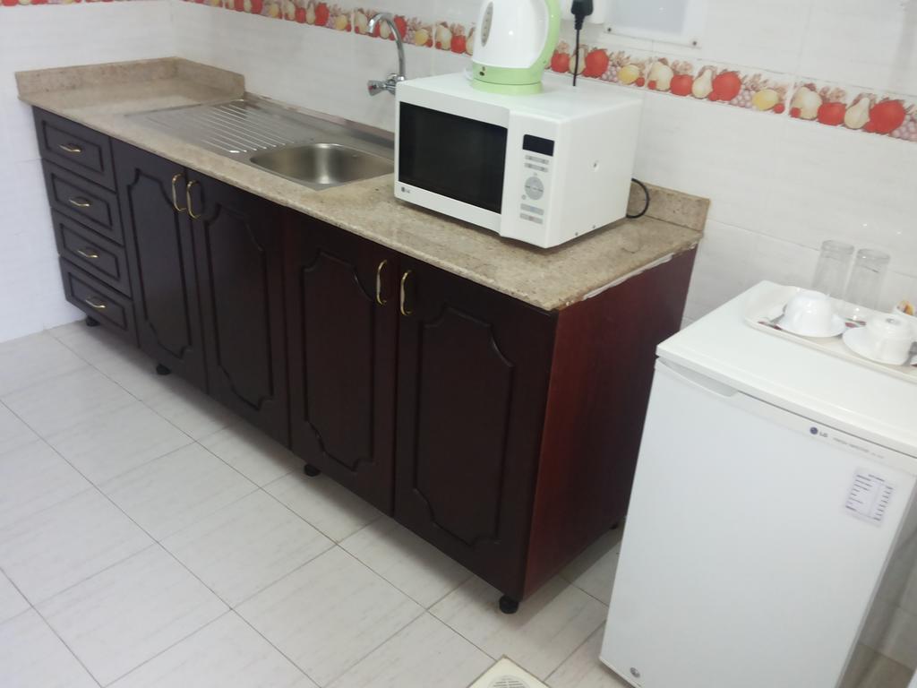 Azaiba Hotel Apartments Mascate Quarto foto